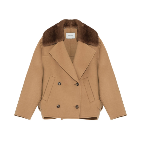 Woman wearing Yves Salomon shearling fur coat – luxury outerwear at Coveti