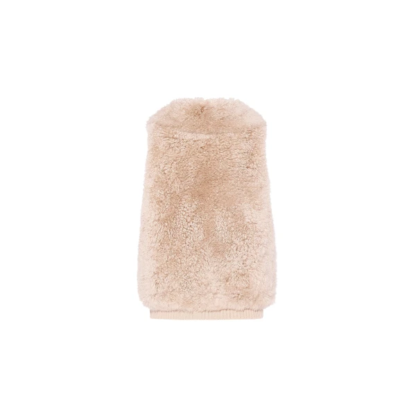 Woman wearing Yves Salomon shearling fur coat – luxury outerwear at Coveti