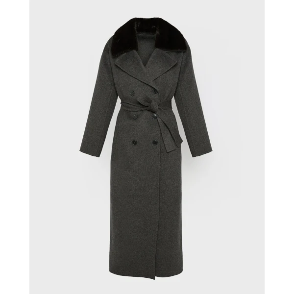 Woman wearing Yves Salomon shearling fur coat – luxury outerwear at Coveti