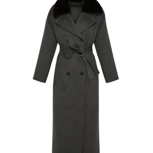 Woman wearing Yves Salomon shearling fur coat – luxury outerwear at Coveti