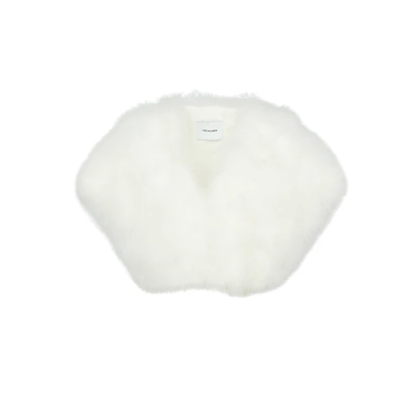 Woman wearing Yves Salomon shearling fur coat – luxury outerwear at Coveti