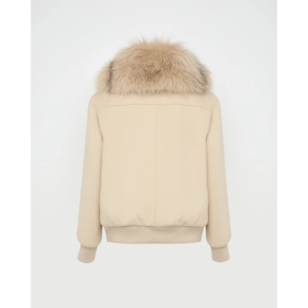Woman wearing Yves Salomon shearling fur coat – luxury outerwear at Coveti