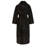 Woman wearing Yves Salomon shearling fur coat – luxury outerwear at Coveti