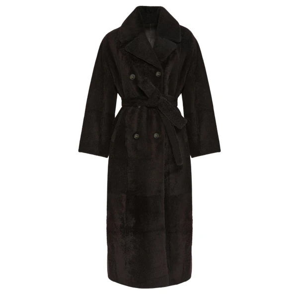 Woman wearing Yves Salomon shearling fur coat – luxury outerwear at Coveti