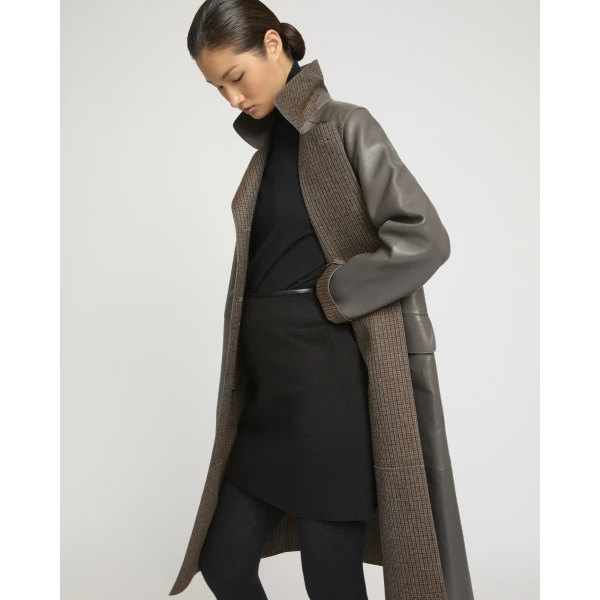 Woman wearing Yves Salomon shearling fur coat – luxury outerwear at Coveti