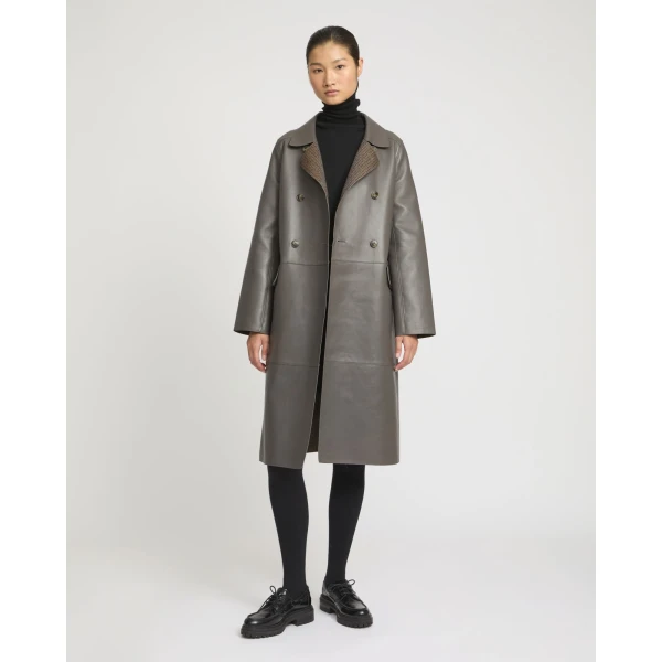 Woman wearing Yves Salomon shearling fur coat – luxury outerwear at Coveti