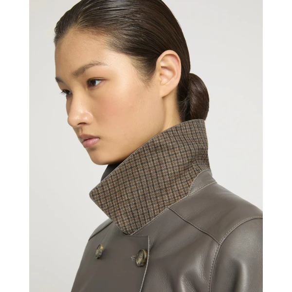 Woman wearing Yves Salomon shearling fur coat – luxury outerwear at Coveti
