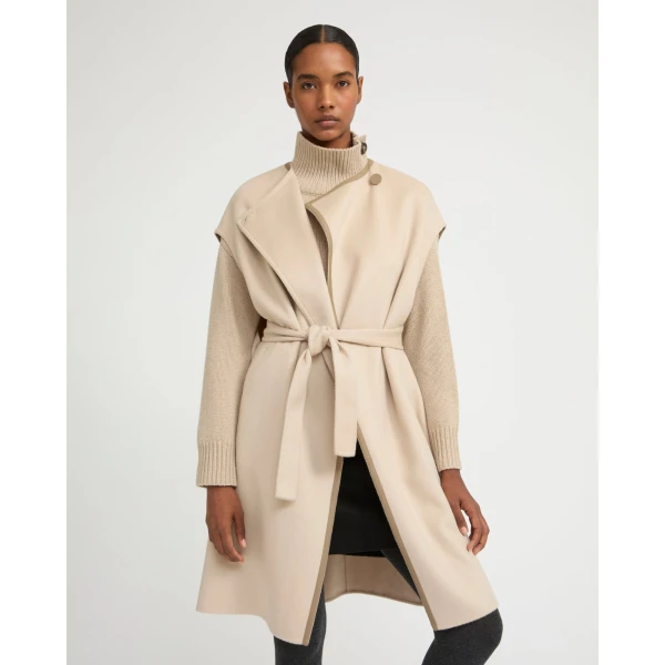 Woman wearing Yves Salomon shearling fur coat – luxury outerwear at Coveti