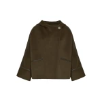 Woman wearing Yves Salomon shearling fur coat – luxury outerwear at Coveti