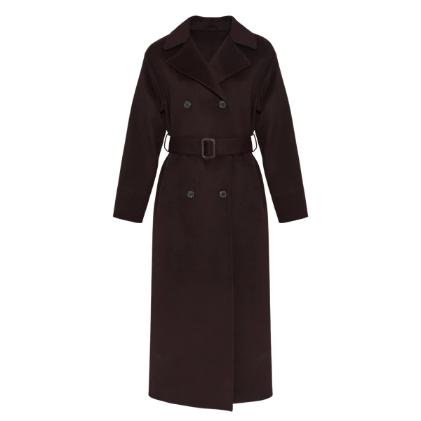 Woman wearing Yves Salomon shearling fur coat – luxury outerwear at Coveti