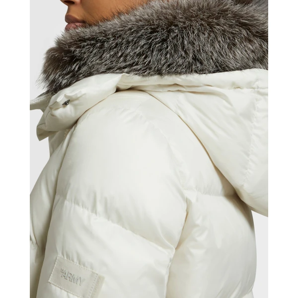 Woman wearing Yves Salomon shearling fur coat – luxury outerwear at Coveti