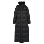 Woman wearing Yves Salomon shearling fur coat – luxury outerwear at Coveti