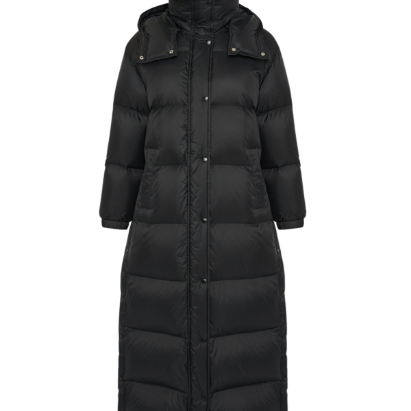 Woman wearing Yves Salomon shearling fur coat – luxury outerwear at Coveti