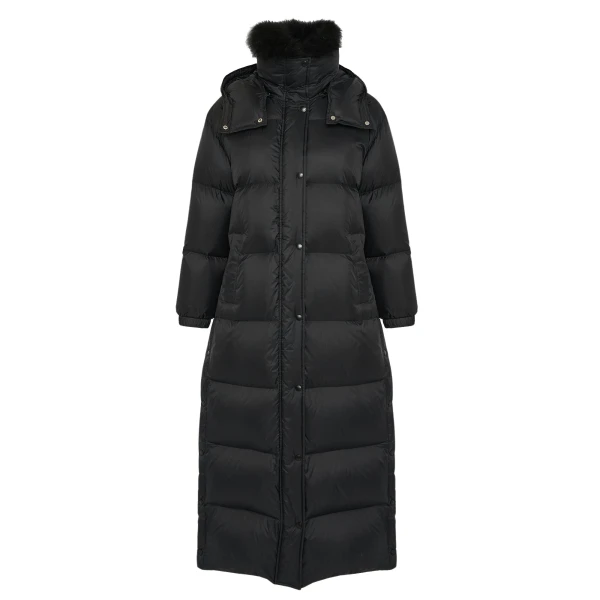 Woman wearing Yves Salomon shearling fur coat – luxury outerwear at Coveti