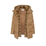 Woman wearing Yves Salomon shearling fur coat – luxury outerwear at Coveti