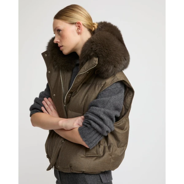 Woman wearing Yves Salomon shearling fur coat – luxury outerwear at Coveti