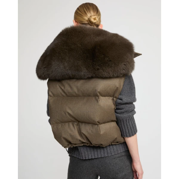 Woman wearing Yves Salomon shearling fur coat – luxury outerwear at Coveti
