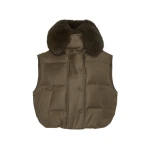 Woman wearing Yves Salomon shearling fur coat – luxury outerwear at Coveti