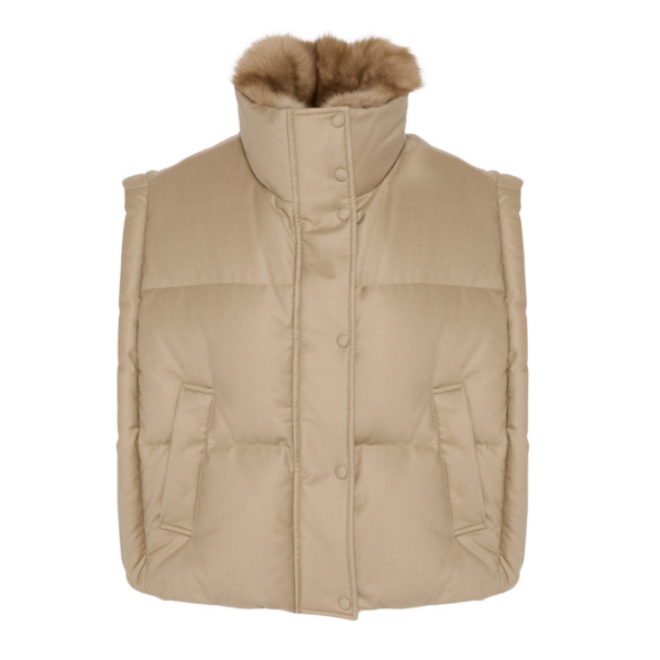 Woman wearing Yves Salomon shearling fur coat – luxury outerwear at Coveti