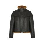 Woman wearing Yves Salomon shearling fur coat – luxury outerwear at Coveti