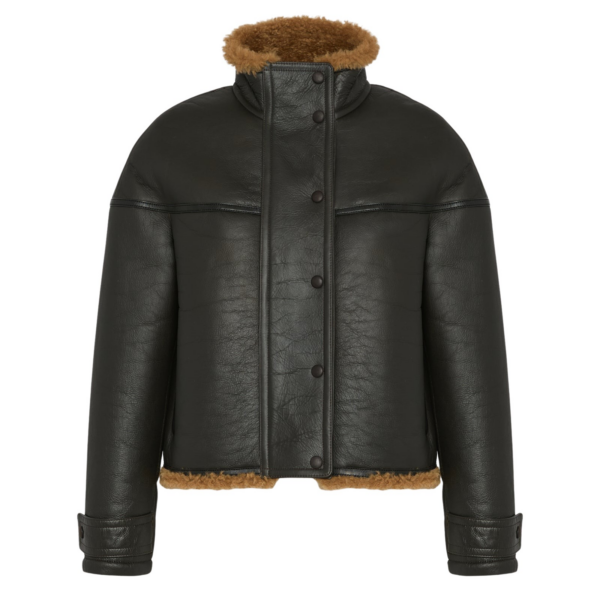 Woman wearing Yves Salomon shearling fur coat – luxury outerwear at Coveti