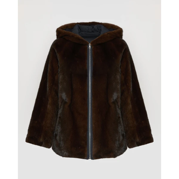 Woman wearing Yves Salomon shearling fur coat – luxury outerwear at Coveti