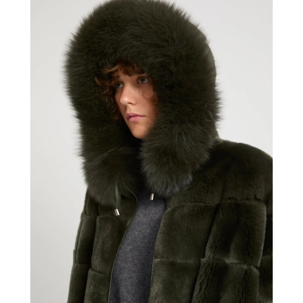 Woman wearing Yves Salomon shearling fur coat – luxury outerwear at Coveti