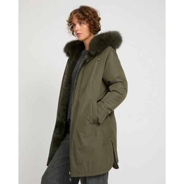 Woman wearing Yves Salomon shearling fur coat – luxury outerwear at Coveti