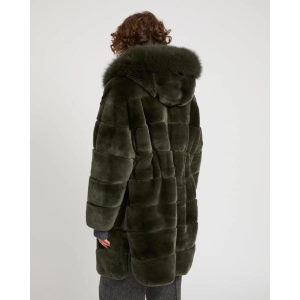 Woman wearing Yves Salomon shearling fur coat – luxury outerwear at Coveti