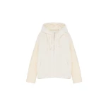 Woman wearing Yves Salomon shearling fur coat – luxury outerwear at Coveti