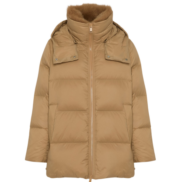 Woman wearing Yves Salomon shearling fur coat – luxury outerwear at Coveti