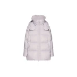 Woman wearing Yves Salomon shearling fur coat – luxury outerwear at Coveti