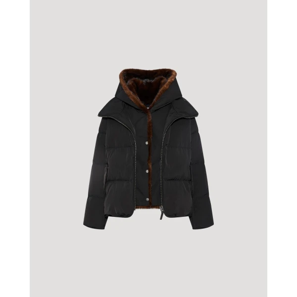 Woman wearing Yves Salomon shearling fur coat – luxury outerwear at Coveti