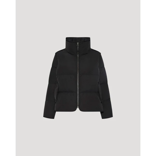 Woman wearing Yves Salomon shearling fur coat – luxury outerwear at Coveti