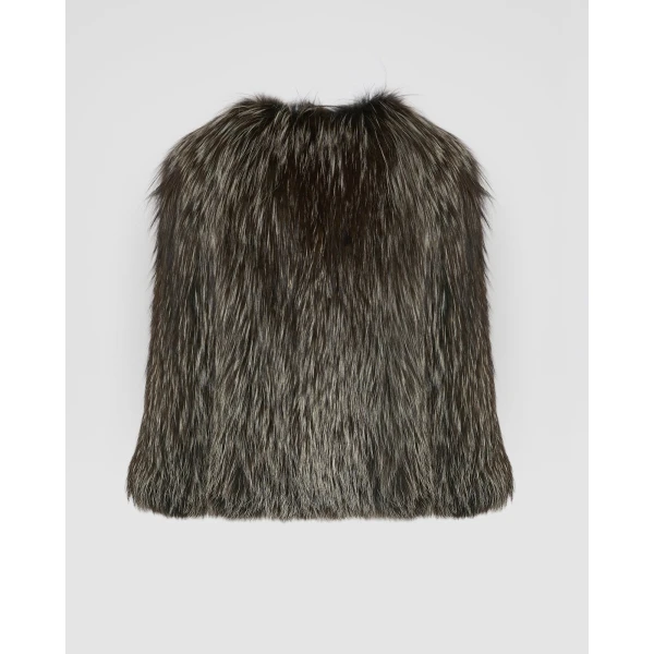Woman wearing Yves Salomon shearling fur coat – luxury outerwear at Coveti