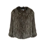 Woman wearing Yves Salomon shearling fur coat – luxury outerwear at Coveti