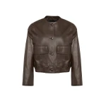 Woman wearing Yves Salomon shearling fur coat – luxury outerwear at Coveti