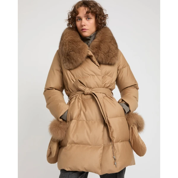 Woman wearing Yves Salomon shearling fur coat – luxury outerwear at Coveti
