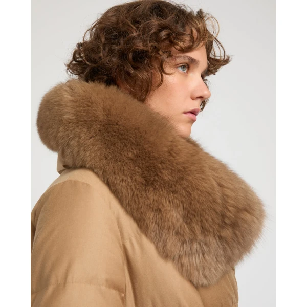 Woman wearing Yves Salomon shearling fur coat – luxury outerwear at Coveti