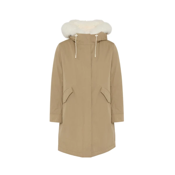 Woman wearing Yves Salomon shearling fur coat – luxury outerwear at Coveti