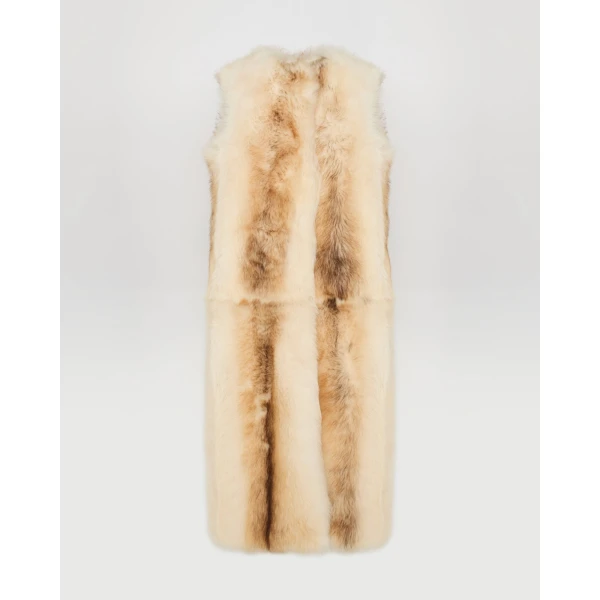 Woman wearing Yves Salomon shearling fur coat – luxury outerwear at Coveti