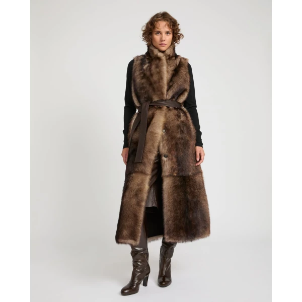 Woman wearing Yves Salomon shearling fur coat – luxury outerwear at Coveti