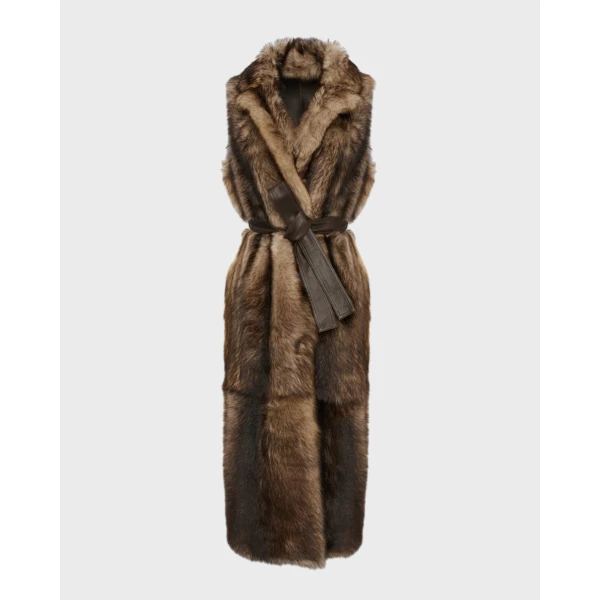 Woman wearing Yves Salomon shearling fur coat – luxury outerwear at Coveti