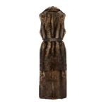 Woman wearing Yves Salomon shearling fur coat – luxury outerwear at Coveti