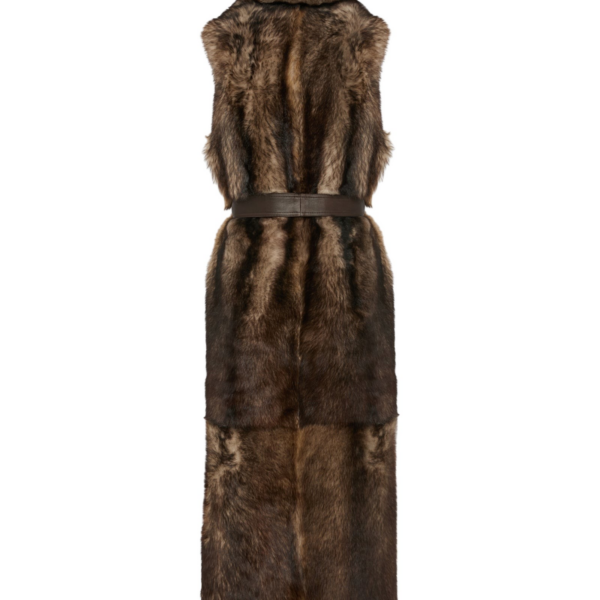 Woman wearing Yves Salomon shearling fur coat – luxury outerwear at Coveti