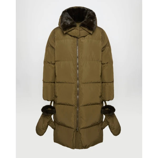 Woman wearing Yves Salomon shearling fur coat – luxury outerwear at Coveti
