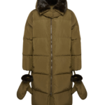 Woman wearing Yves Salomon shearling fur coat – luxury outerwear at Coveti