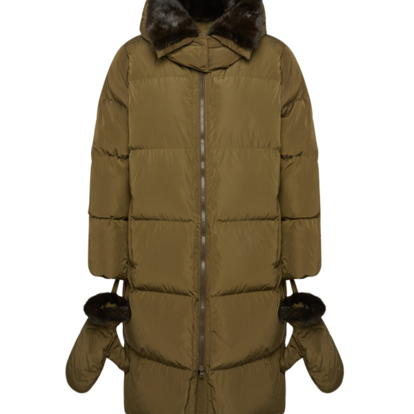 Woman wearing Yves Salomon shearling fur coat – luxury outerwear at Coveti