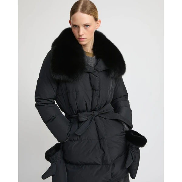 Woman wearing Yves Salomon shearling fur coat – luxury outerwear at Coveti
