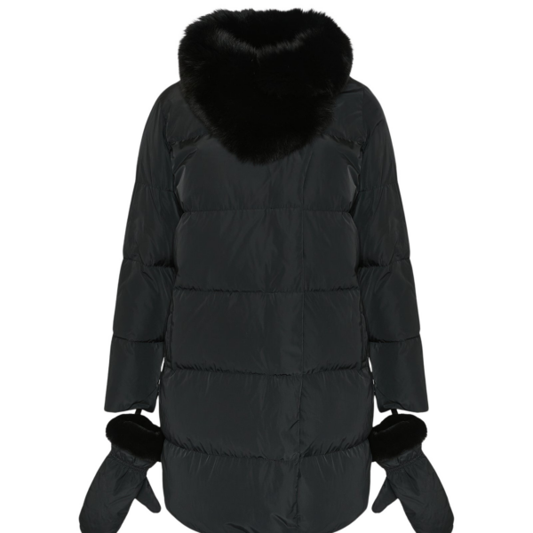 Woman wearing Yves Salomon shearling fur coat – luxury outerwear at Coveti